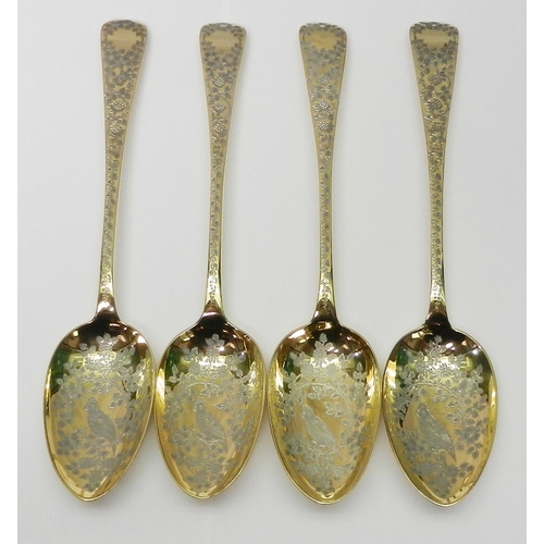 6 - A cased matched set of four George IV silver table spoons, London 1827 & 1828, later gilding and eng... 