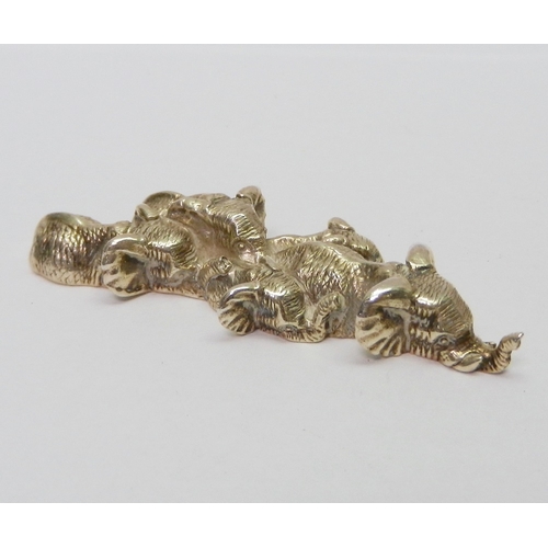 67 - Elephants moving through water, white metal miniature group by Patrick Mavros bearing Zimbabwe marks... 