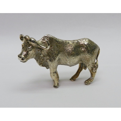 67 - Elephants moving through water, white metal miniature group by Patrick Mavros bearing Zimbabwe marks... 