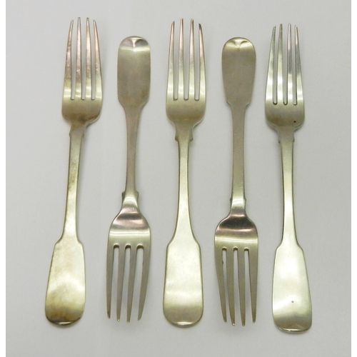 70 - A matched set of five Irish silver fiddle pattern table forks, three Samuel Neville, Dublin 1829.  A... 