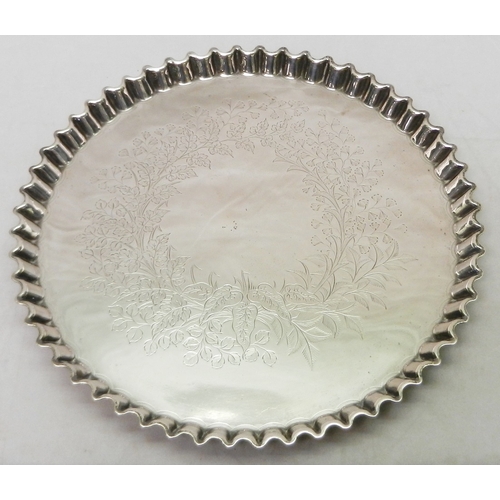 72 - A Victorian silver waiter having a pie crimped / pastry crust edge and foliate engraved face, Willia...