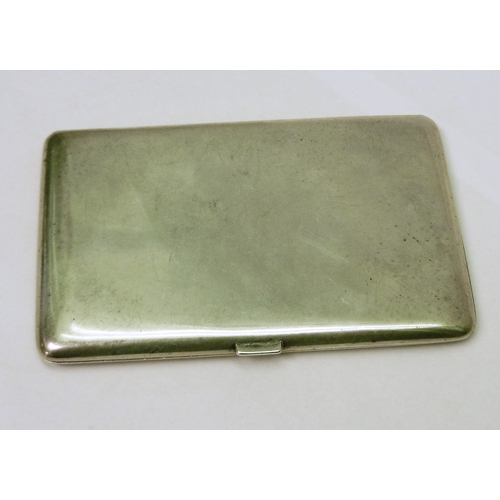 79 - A cigarette case having plain polished exterior, engraved with initials IDHH.  128 x 81mm / 200g