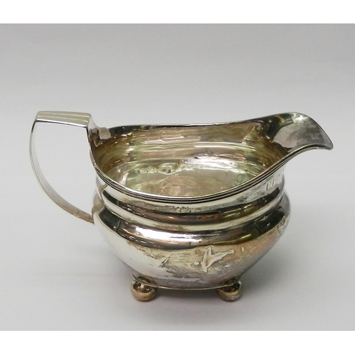 9 - A George III silver jug, James Barber and William Whitwell (mark being the pebbled background versio... 