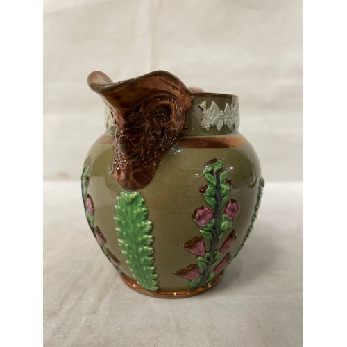 191 - A 19thC Wood & son relief jug 10cm tall