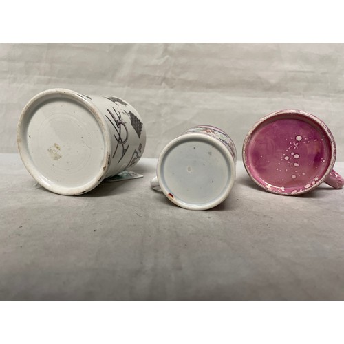 192 - A 19thC agricultural interest cup together with a pink lustre cup and a further small cup (3)