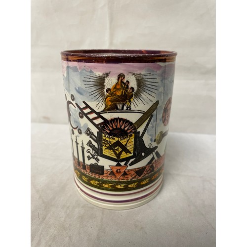 193 - A 19thC Masonic creamware tankard 12cm tall