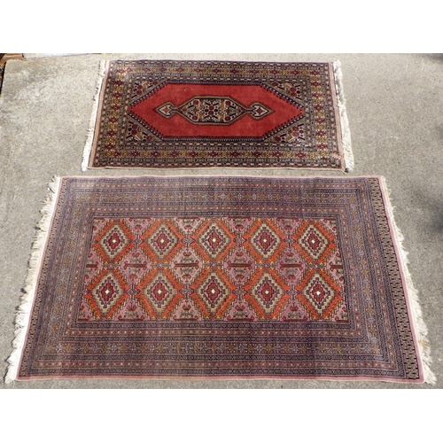 706 - A Pakistani style rug 100 x 160cm together with a further rug 125 x 200cm , moth damage (2)