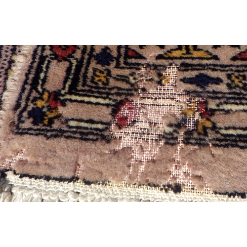 706 - A Pakistani style rug 100 x 160cm together with a further rug 125 x 200cm , moth damage (2)