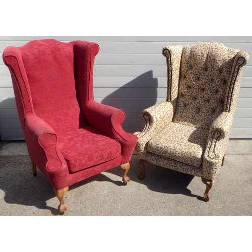 709 - Two wing back arm chairs with claw & ball feet