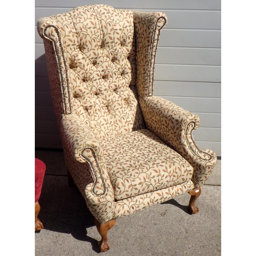 709 - Two wing back arm chairs with claw & ball feet