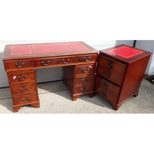 713 - A reproduction mahogany red leather topped pedestal desk and filing cabinet (2)