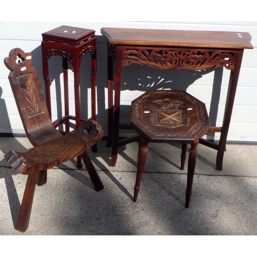 718 - An Oriental hardwood vase stand, carved top side table, hall table and a birthing chair (4)