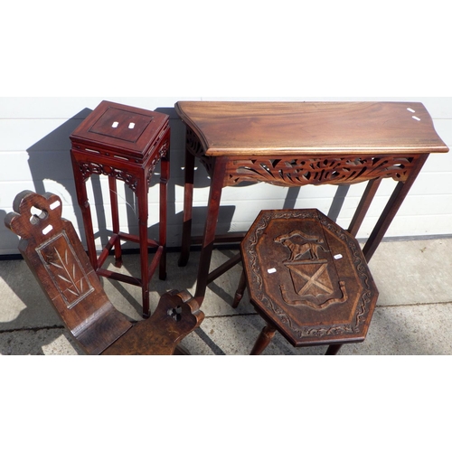 718 - An Oriental hardwood vase stand, carved top side table, hall table and a birthing chair (4)