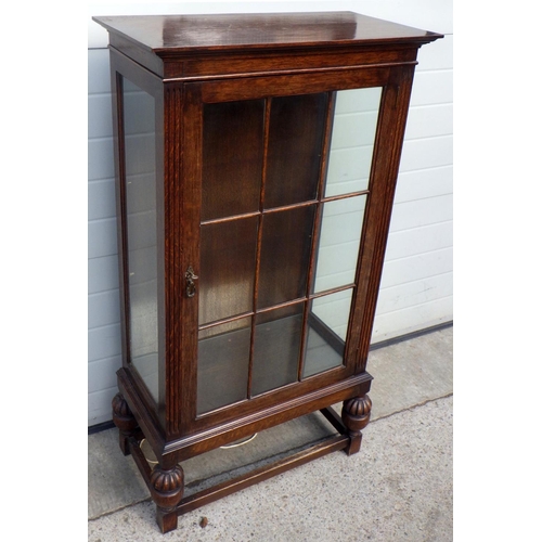 740 - An oak single door display cabinet 75cm wide