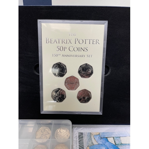 167 - Collectors Coins: A qty of Beatrix Potter 50p coin packs etc