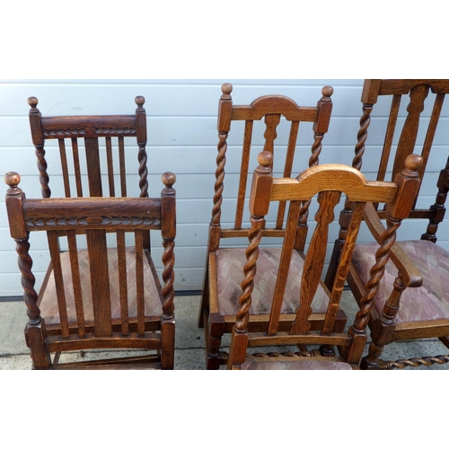 828 - A pair of 1930's barleytwist oak carver chairs together with two matching single chairs and two furt... 