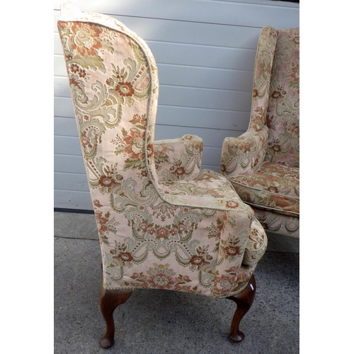 840 - A pair of wingback armchairs on oak cabriole legs, early 20th cen