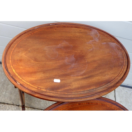 841 - An Edwardian oval nest of three occasional tables, a/f