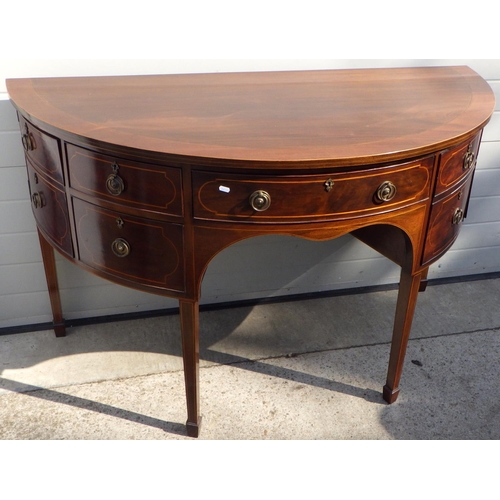 845 - A mahogany bowfronted sideboard, 157cm wide