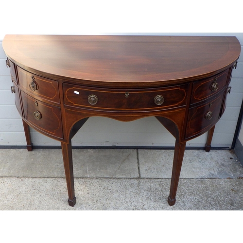 845 - A mahogany bowfronted sideboard, 157cm wide