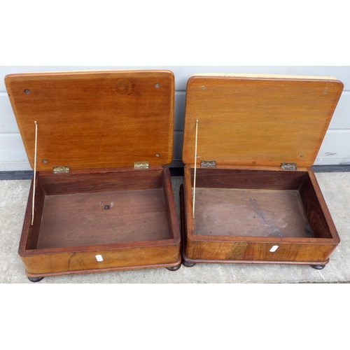 849 - A pair of Victorian walnut footstools with hinged seats