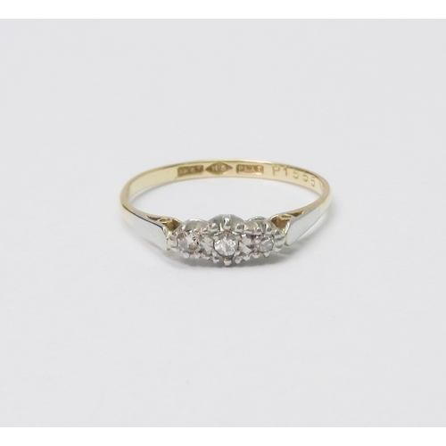 31 - A trilogy ring comprising three illusion set diamonds in an 18ct gold setting.  1.5g gross