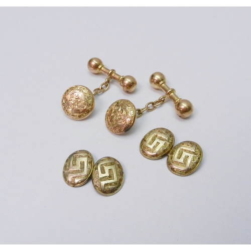 33 - A pair of Victorian chain link cufflinks comprising bar bell ends and engraved circular heads, 15ct ... 