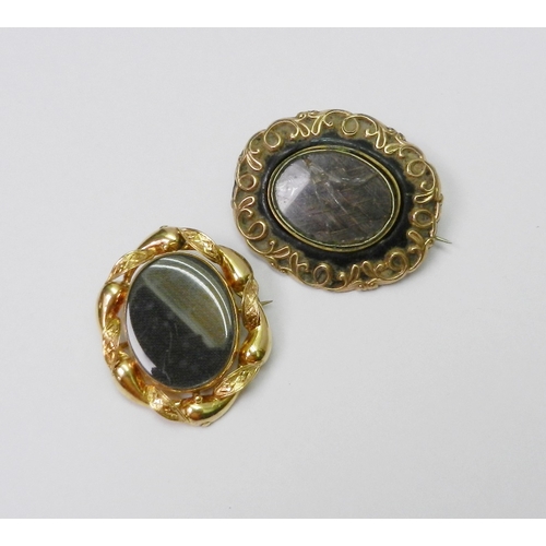 37 - A mourning brooch having central swivel panel within a 