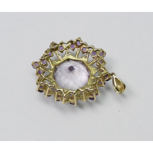 58 - A pendant of star-burst design comprising synthetic amethyst stones in a 9ct gold mount.  A/F stones... 