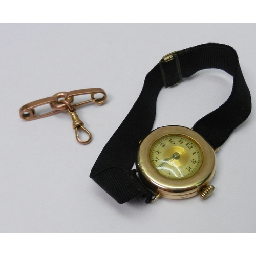 84 - A 9ct gold cased ladies wire-lug wrist watch c1920s; a ladies Tudor gold plated wristwatch on a gold... 