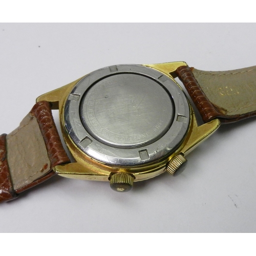 89 - A Smiths mid-sized wristwatch comprising an English made 15 jewel movement in a Denisteel case, 30mm... 