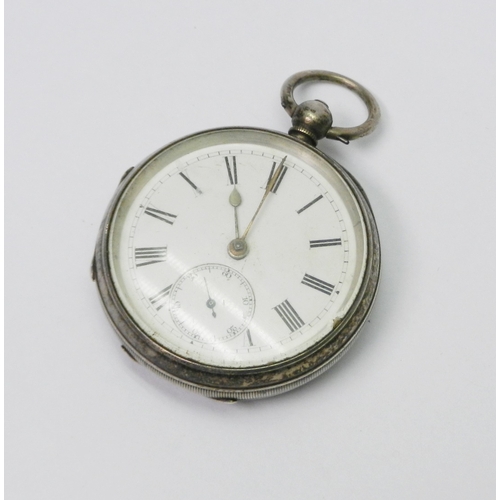 91 - A silver cased pocket watch having a key wind lever movement.  52mm across