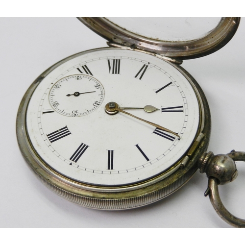 91 - A silver cased pocket watch having a key wind lever movement.  52mm across