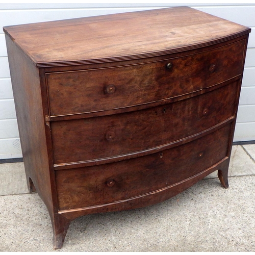 853 - A Regency mahogany bowfronted chest of drawers, missing handles, 100cm wide