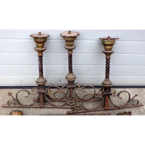 855 - A qty of wrought iron & brass balustrade hardware