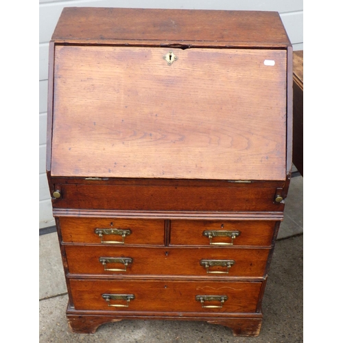 861 - A 19th cen Pembroke table, hall chair and an oak bureau, missing foot (3) (a/f)