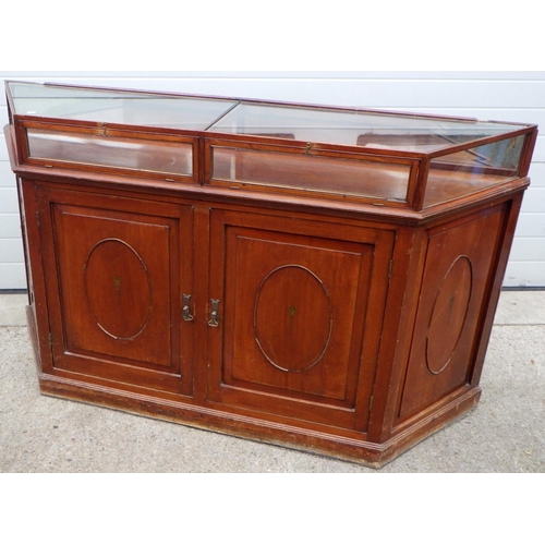 882 - A flat topped cabinet (a/f), 183cm wide