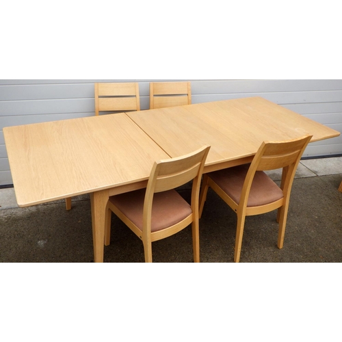 889 - A light coloured Ercol ercolani Siena collection, table, 171cm long unextended, four chairs and side... 