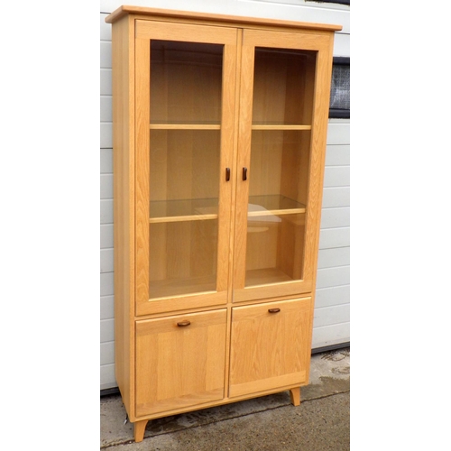 890 - A light coloured Ercol ercolani Siena collection cabinet, 186cm tall, 96cm wide