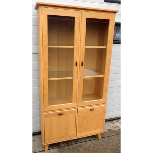 890 - A light coloured Ercol ercolani Siena collection cabinet, 186cm tall, 96cm wide