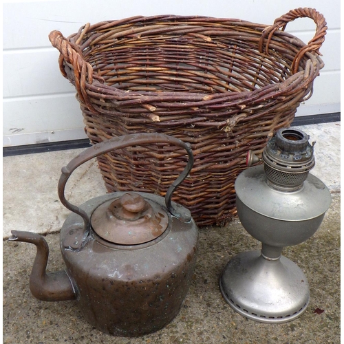 898 - A wicker basket, copper kettle and an oil lamp