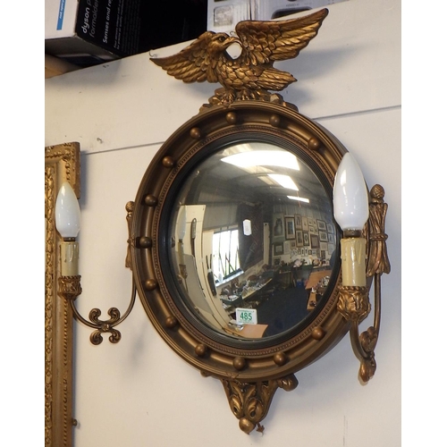 485 - A Regency style gilt framed convex mirror, with mounted perched eagle and sconces 60 x 75cm