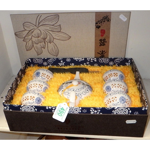 490 - An oriental boxed tea set