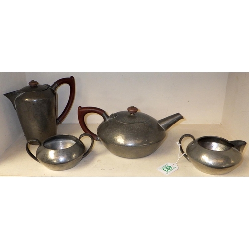 493 - A four piece Arts & Crafts Tudric Liberty & Co pewter tea set no:01538