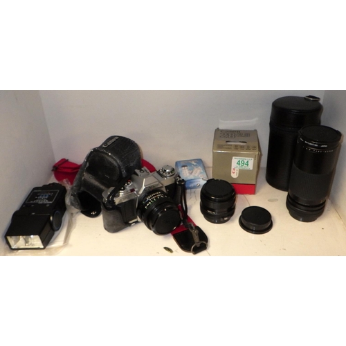 494 - A Canon AV-1 camera and accessories