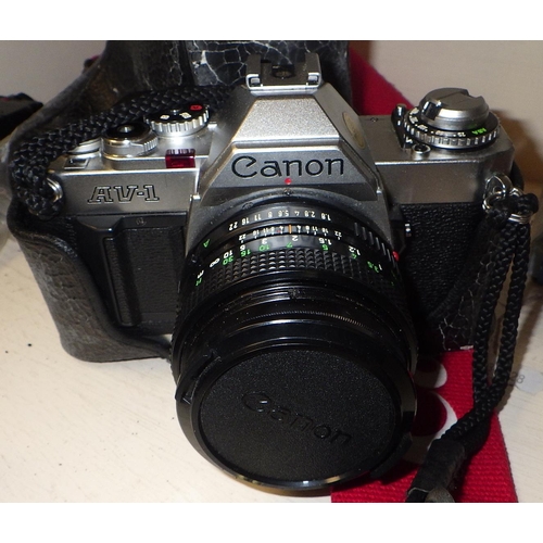 494 - A Canon AV-1 camera and accessories