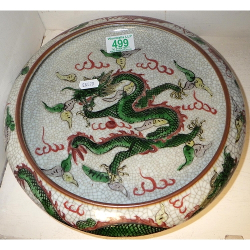 499 - A Chinese crackle glaze circular bowl decorated with dragons 27cm diameter