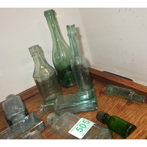 505 - A tray lot of vintage advertising bottles