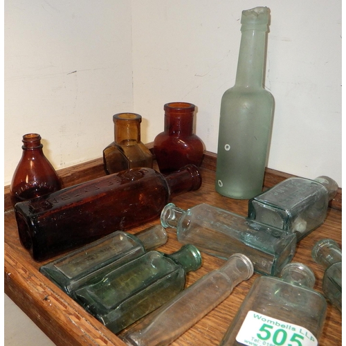 505 - A tray lot of vintage advertising bottles