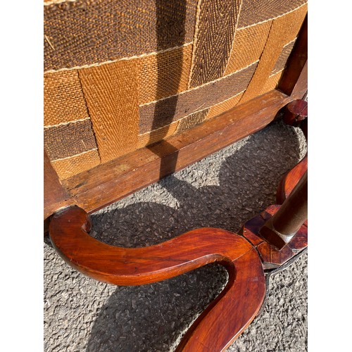 502 - A mahogany lazy Susan 46cm diameter together with a foot stool (old worm & repairs) (2)